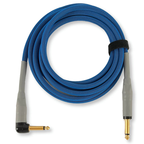 A coiled blue audio cable with gray plugs and gold connectors, secured with a black strap on a white background.