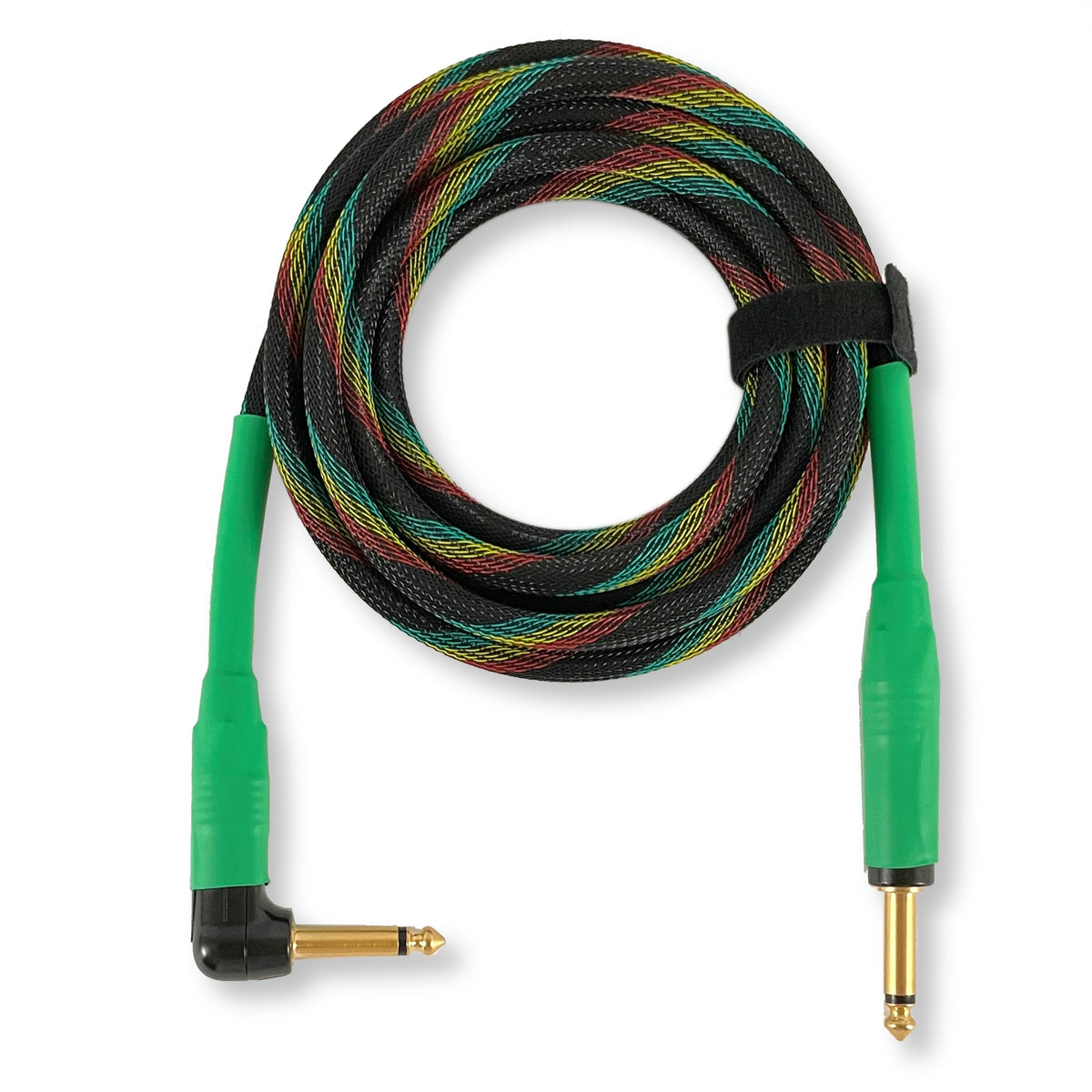 A coiled audio adapter cable with a black braided outer sheath showing teal, yellow, and red inner strands, featuring bright green plug housings and gold-plated 1/4-inch jack connectors on a white background.