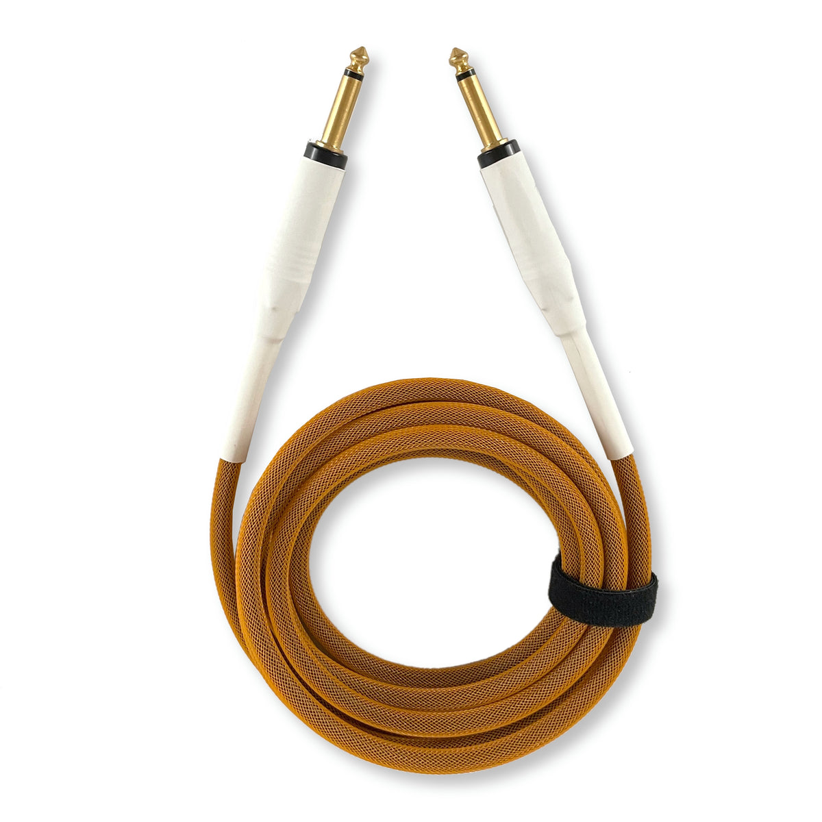 A coiled audio cable with a braided orange outer jacket, white connector housings, and gold-plated jack tips, secured with a black loop on a white background.