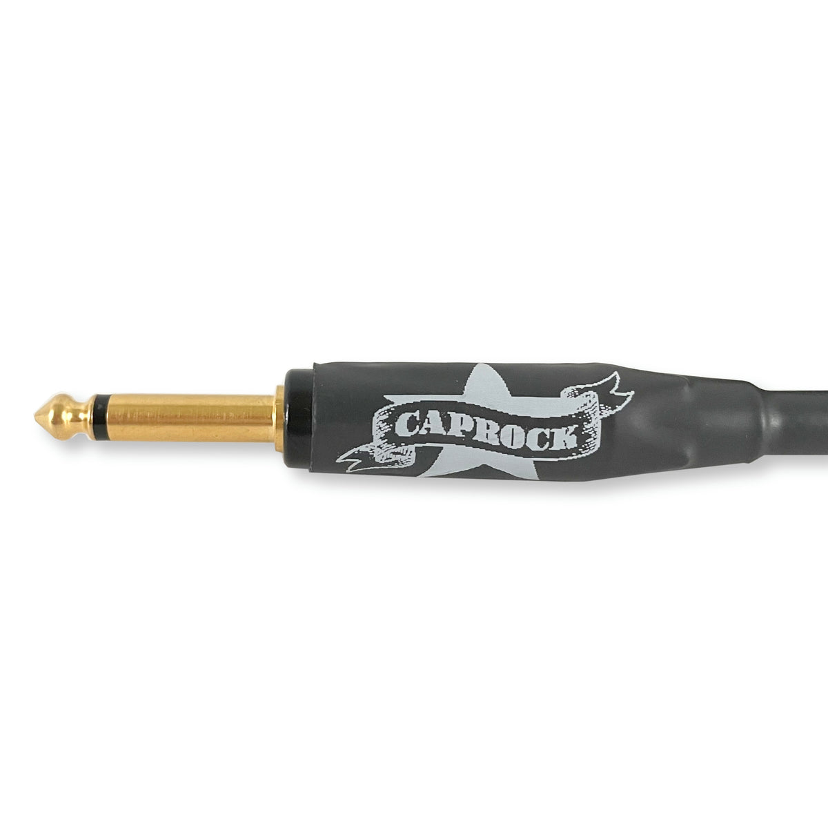 A close-up of a Caprock 1/4 inch guitar plug on a black cable, featuring a gold-plated connector and a black sleeve with a white and gray logo.