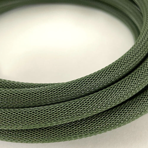 A close-up of a coiled olive green braided cable or cord on a plain light background.